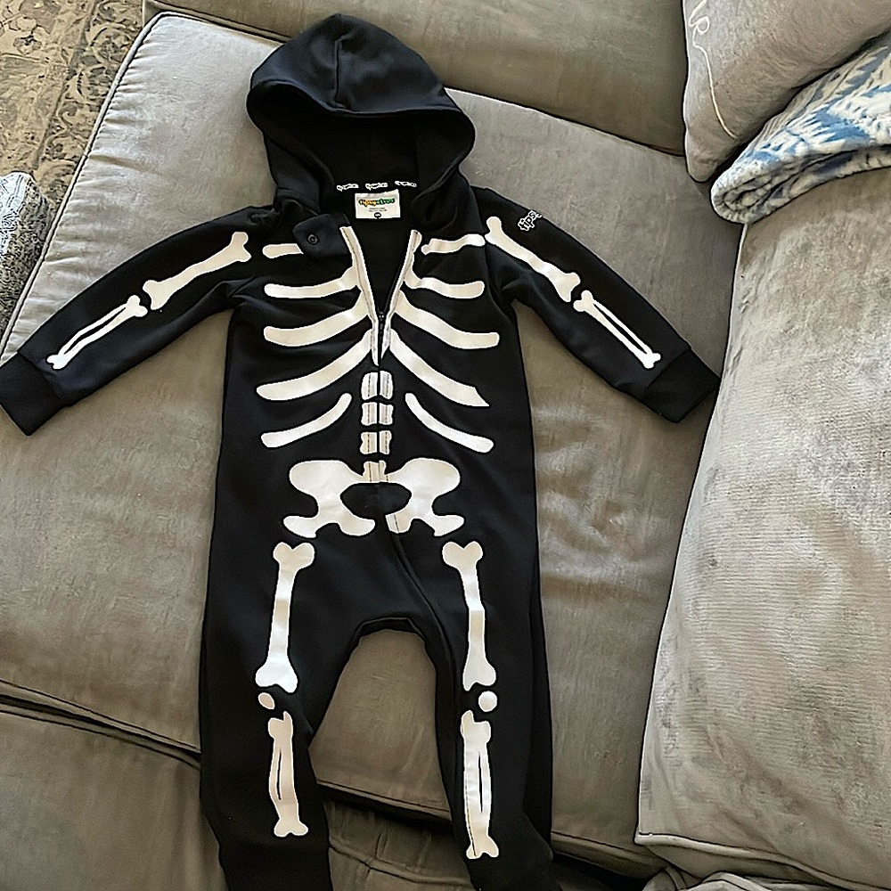 Worn twice. 12 month tipsy elves skeleton one piece zip up